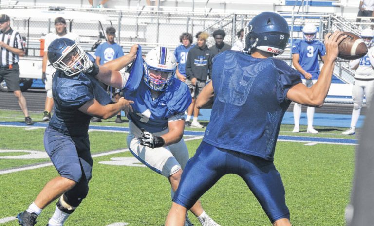 Photos: Local scrimmages kick off Friday night schedules